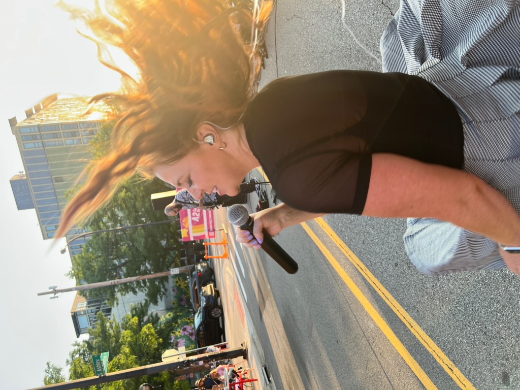 Emily, vocalist of Party Fowl, performs in Ann Arbor, Michigan